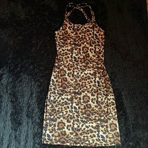 Leopard crisscross open back mini dress size large